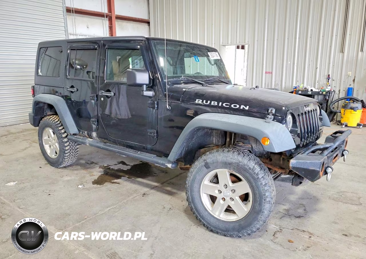 2011 Jeep Wrangler Unlimited Rubicon VIN:1J4HA6H16BL565252 - 4
