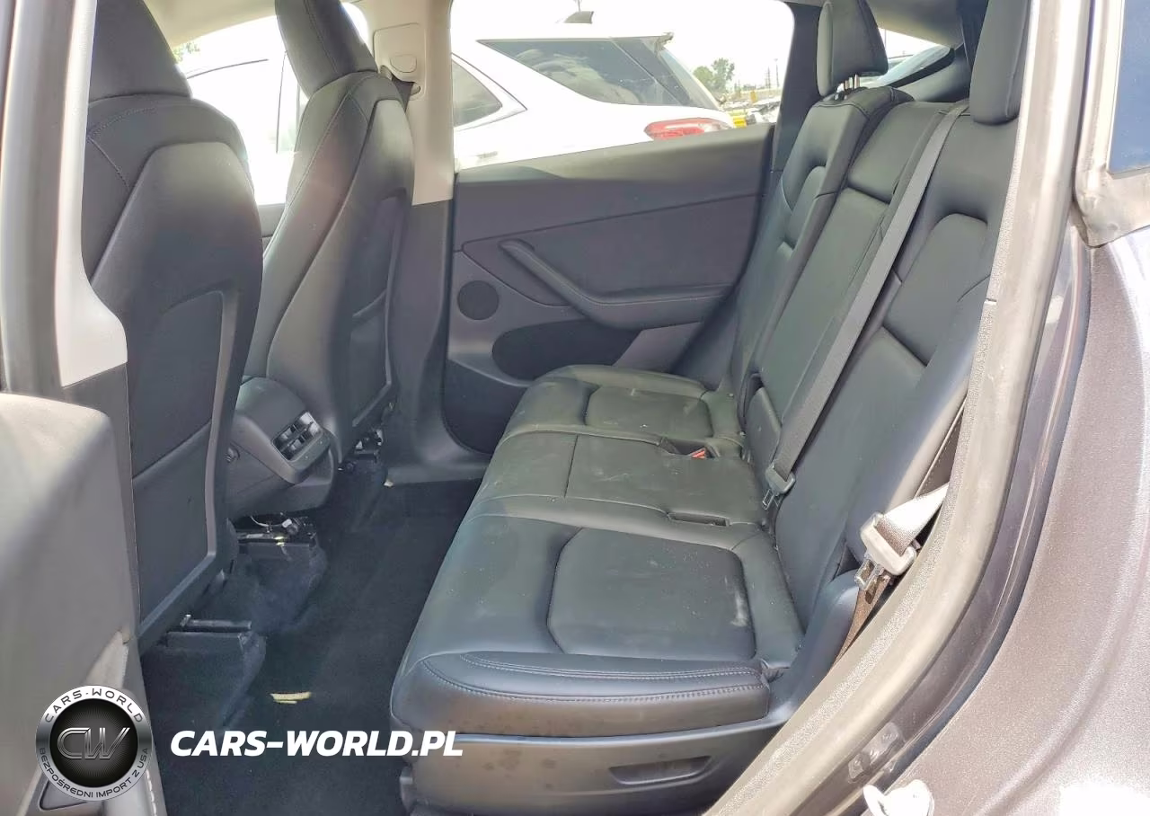 2023 Tesla Model Y VIN:7SAYGAEE4PF834022 - 11