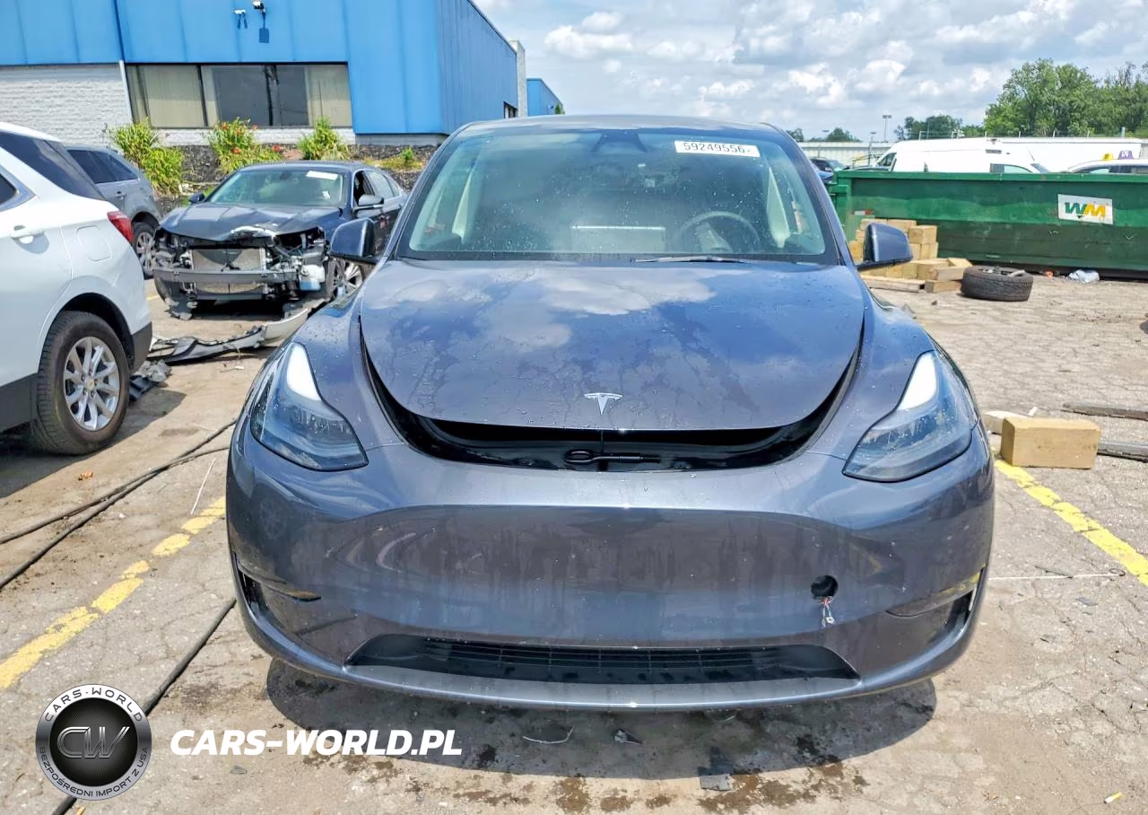 2023 Tesla Model Y VIN:7SAYGAEE4PF834022 - 5