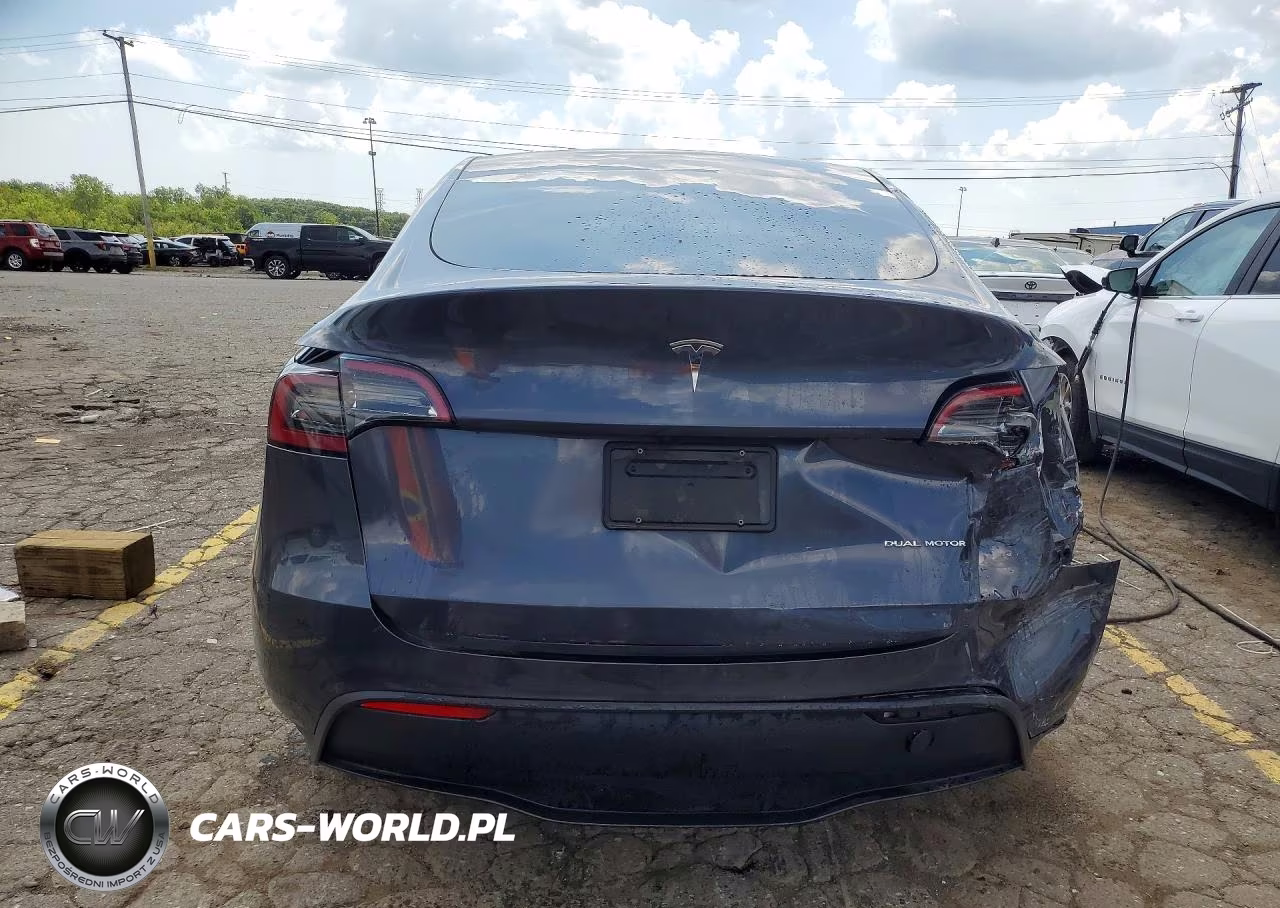 2023 Tesla Model Y VIN:7SAYGAEE4PF834022 - 6