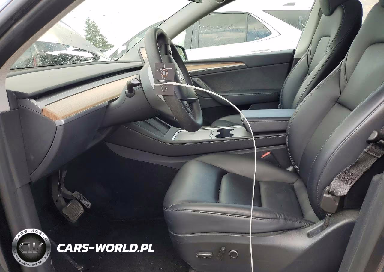 2023 Tesla Model Y VIN:7SAYGAEE4PF834022 - 7