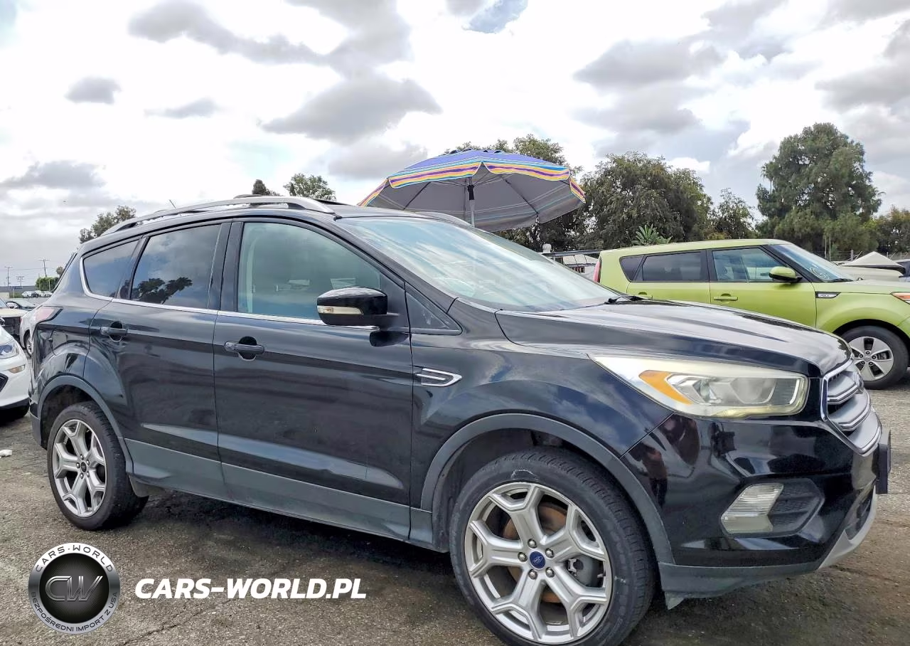 2017 Ford Escape Titanium VIN:1FMCU9JDXHUF04000 - 4