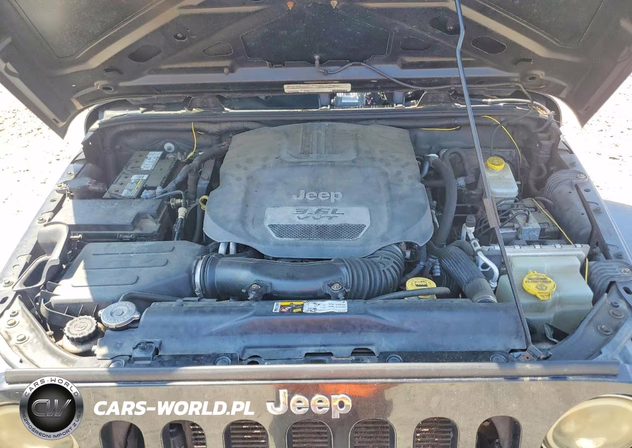 2012 Jeep Wrangler Unlimited Sport VIN:1C4BJWDG6CL249230 - 11