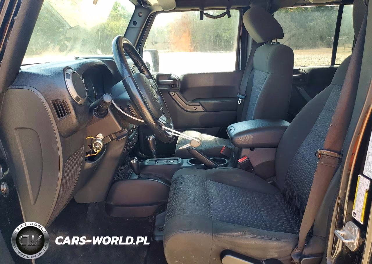 2012 Jeep Wrangler Unlimited Sport VIN:1C4BJWDG6CL249230 - 7