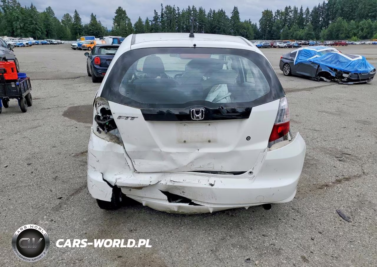 2009 Honda Fit VIN:JHMGE88289C001895 - 6