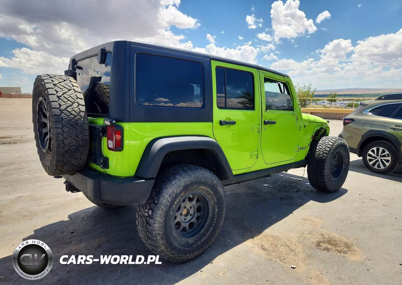 2012 Jeep Wrangler Unlimited Rubicon VIN:1C4BJWFG3CL248677 - 3