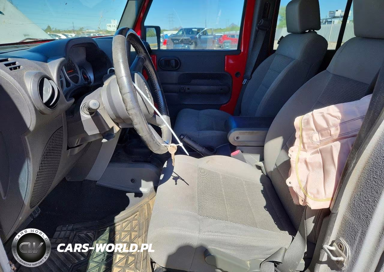 2009 Jeep Wrangler Unlimited Rubicon VIN:1J8GA69129L729423 - 7