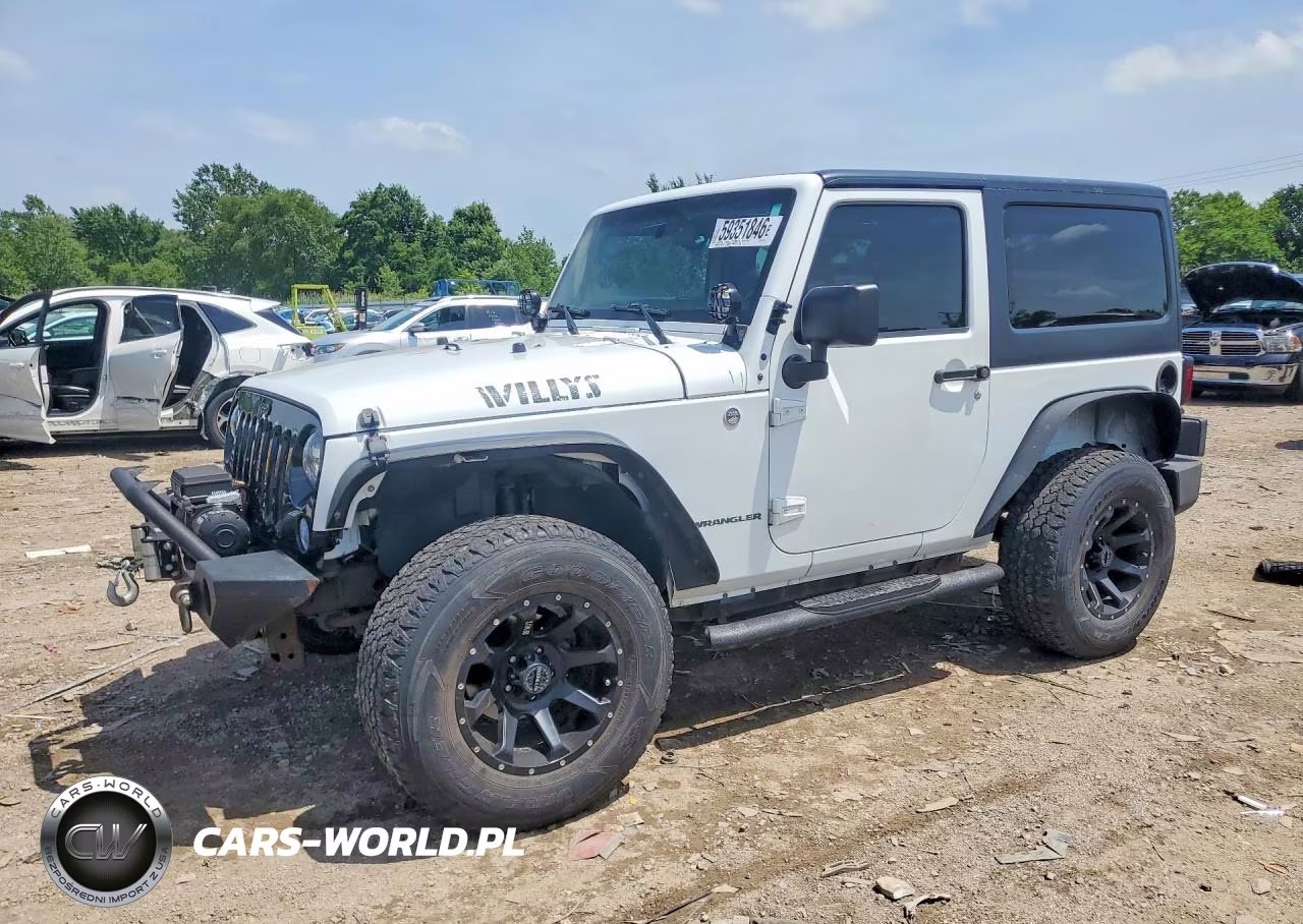 2015 Jeep Wrangler Sport VIN:1C4AJWAGXFL572054 - 1