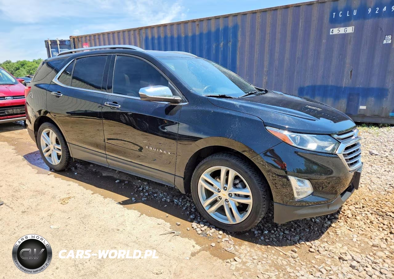 2018 Chevrolet Equinox Premier VIN:2GNAXMEV7J6244627 - 4