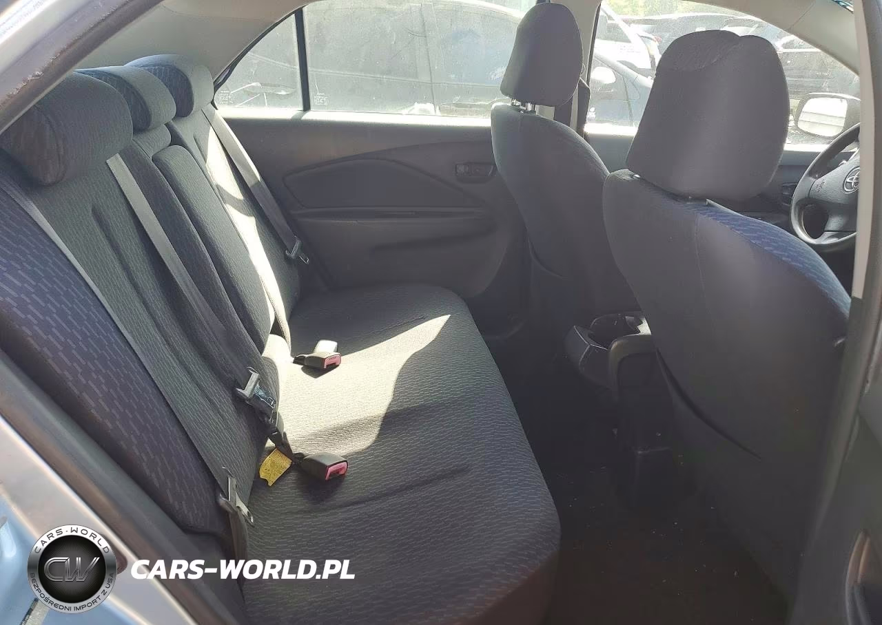 2009 Toyota Yaris Base VIN:JTDBT923X91308523 - 10