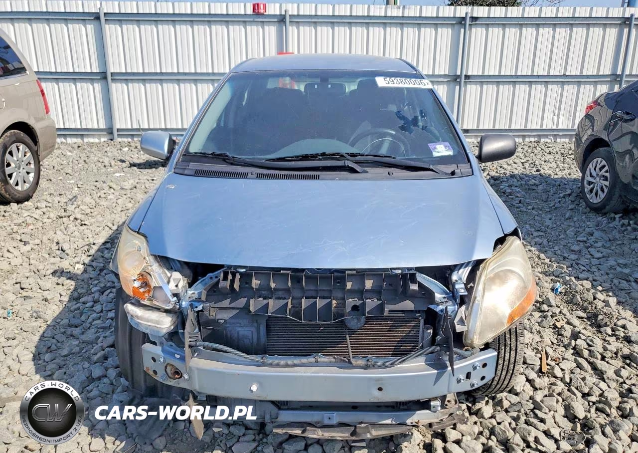 2009 Toyota Yaris Base VIN:JTDBT923X91308523 - 5