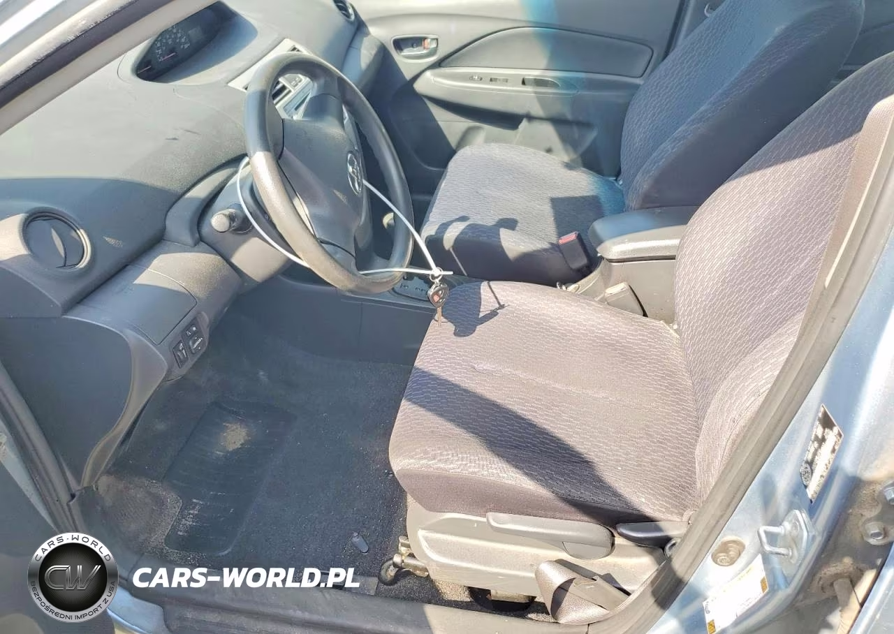 2009 Toyota Yaris Base VIN:JTDBT923X91308523 - 7