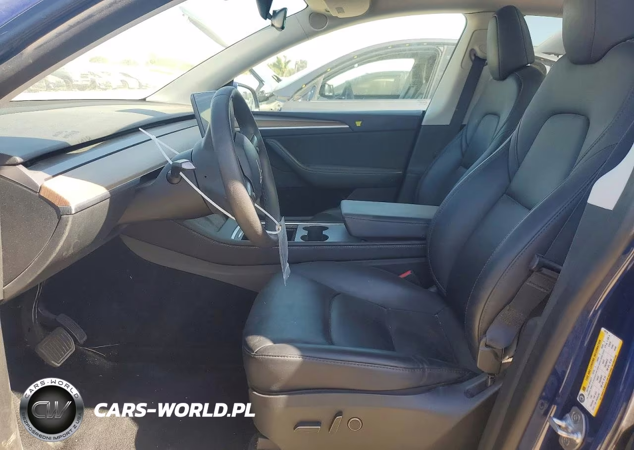 2023 Tesla Model Y VIN:7SAYGDEEXPF742110 - 7