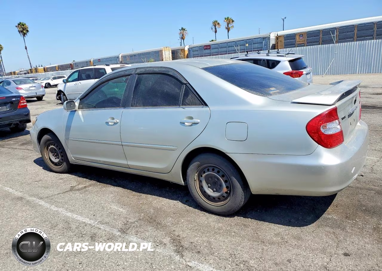 2002 Toyota Camry Le VIN:JTDBE32K120117437 - 2