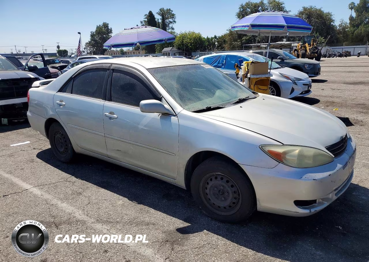 2002 Toyota Camry Le VIN:JTDBE32K120117437 - 4