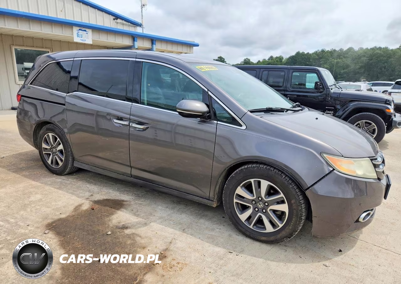 2014 Honda Odyssey Touring VIN:5FNRL5H9XEB125451 - 4