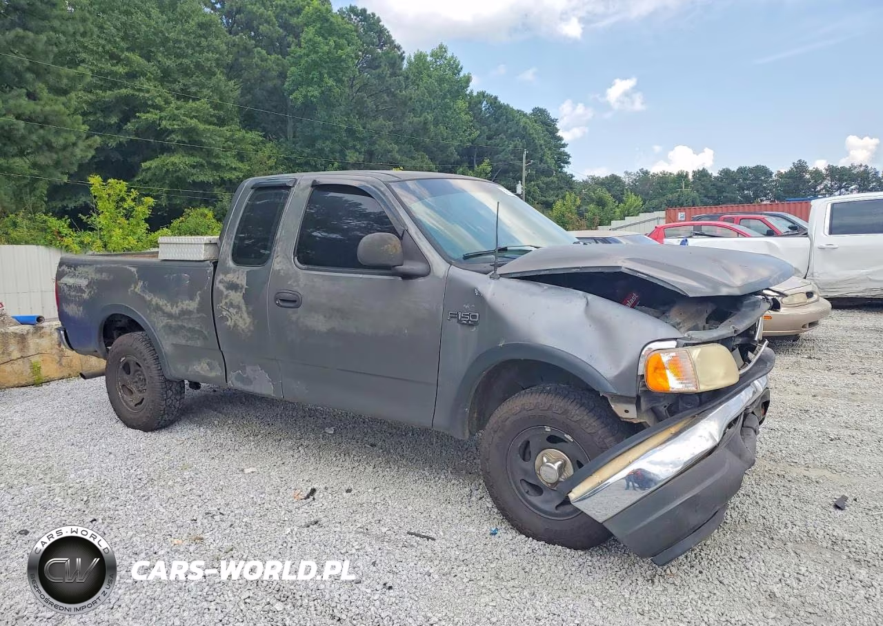 2002 Ford F150 VIN:1FTRX18L32NC05597 - 4