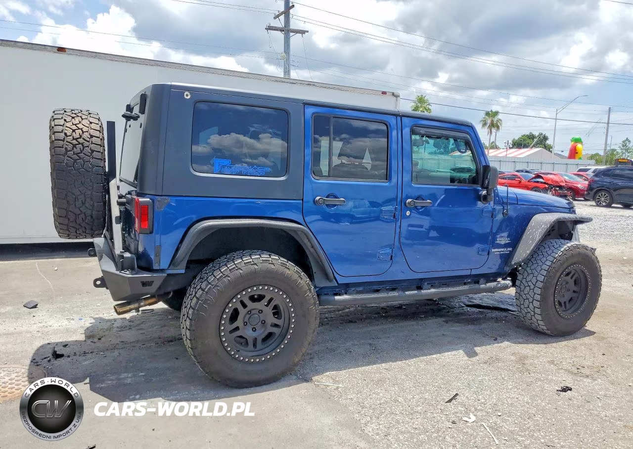 2010 Jeep Wrangler Unlimited Sahara VIN:1J4BA5H15AL196477 - 3