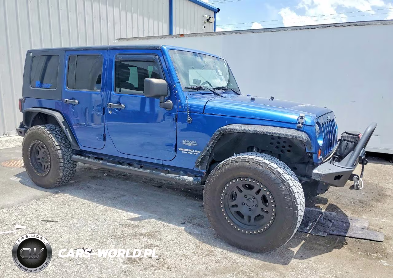 2010 Jeep Wrangler Unlimited Sahara VIN:1J4BA5H15AL196477 - 4