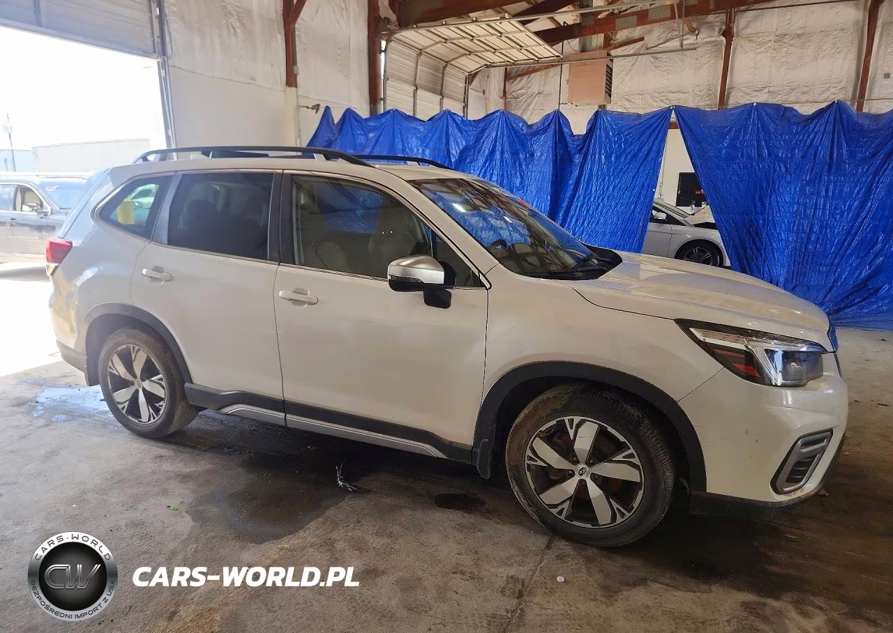 2021 Subaru Forester Touring VIN:JF2SKAXC9MH409874 - 4