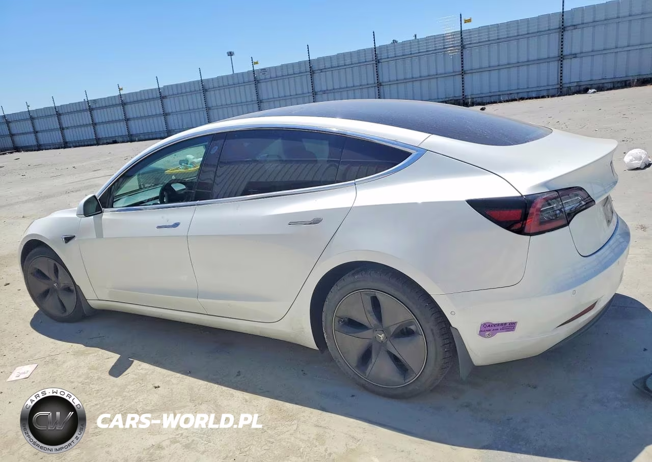 2018 Tesla Model 3 VIN:5YJ3E1EB0JF100214 - 2