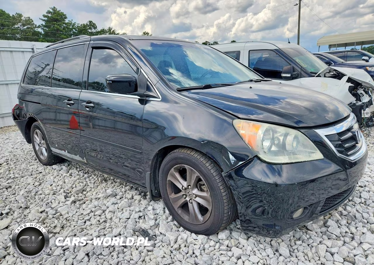 2010 Honda Odyssey Touring VIN:5FNRL3H91AB056292 - 4