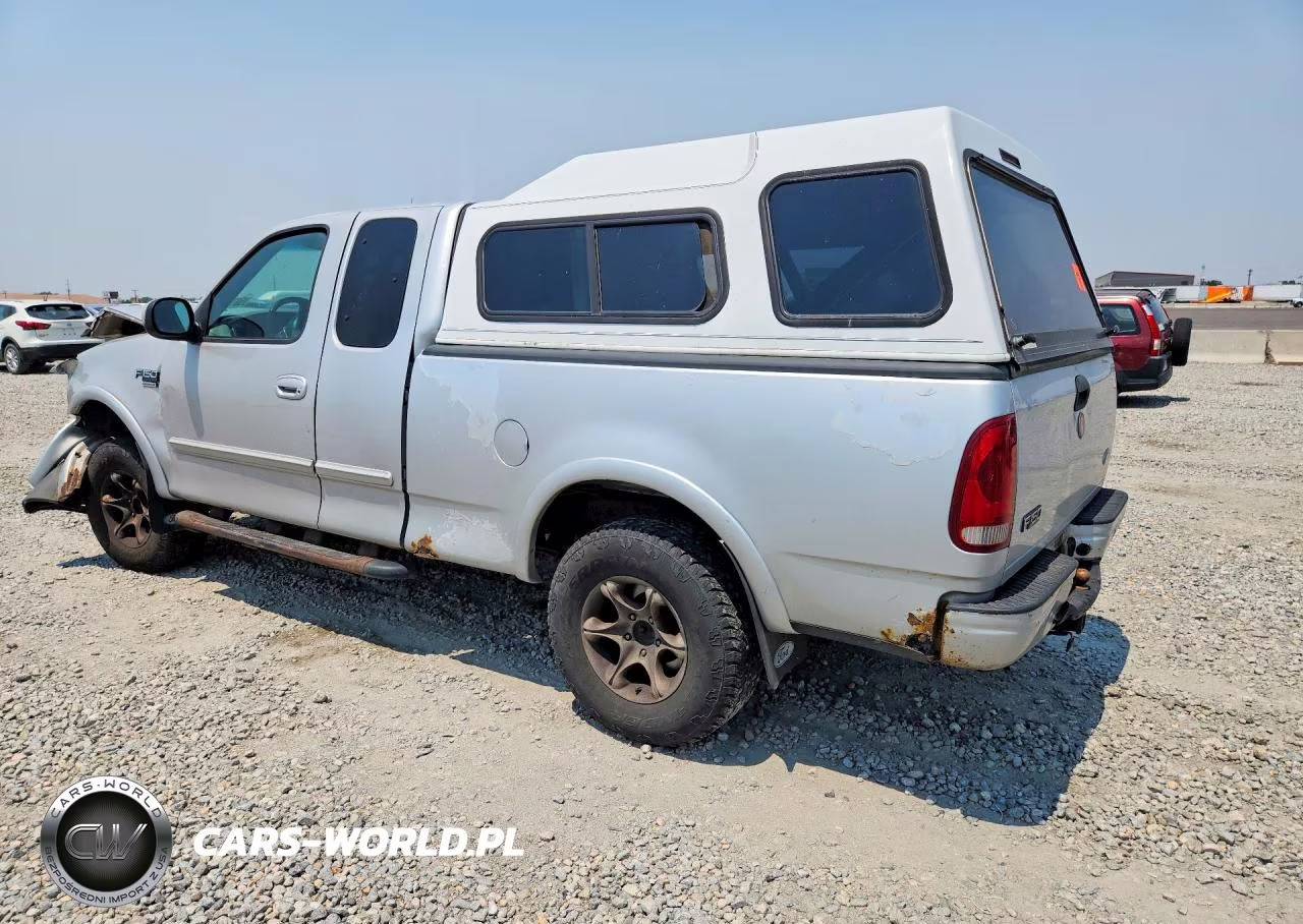 1999 Ford F150 VIN:1FTRX18L2XKB27242 - 2
