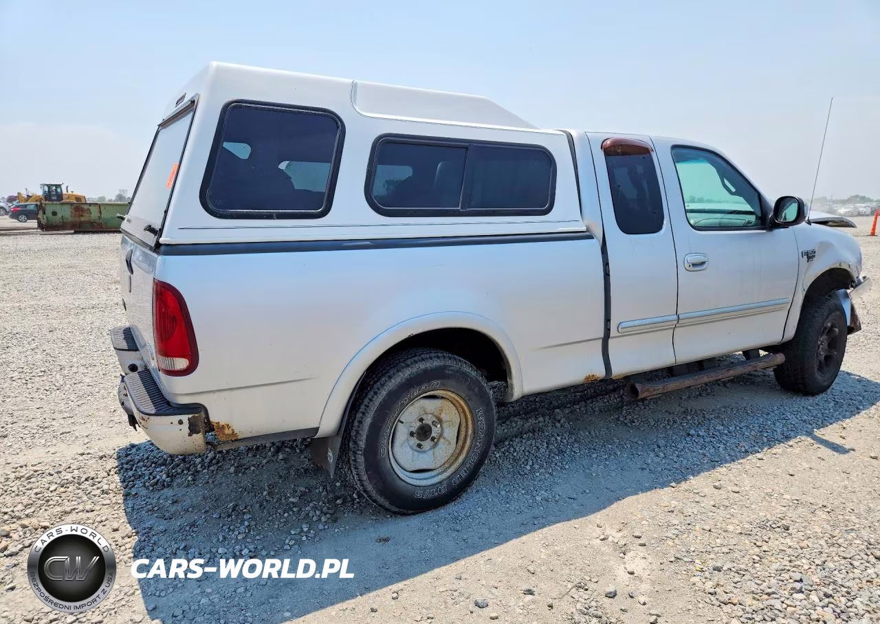 1999 Ford F150 VIN:1FTRX18L2XKB27242 - 3