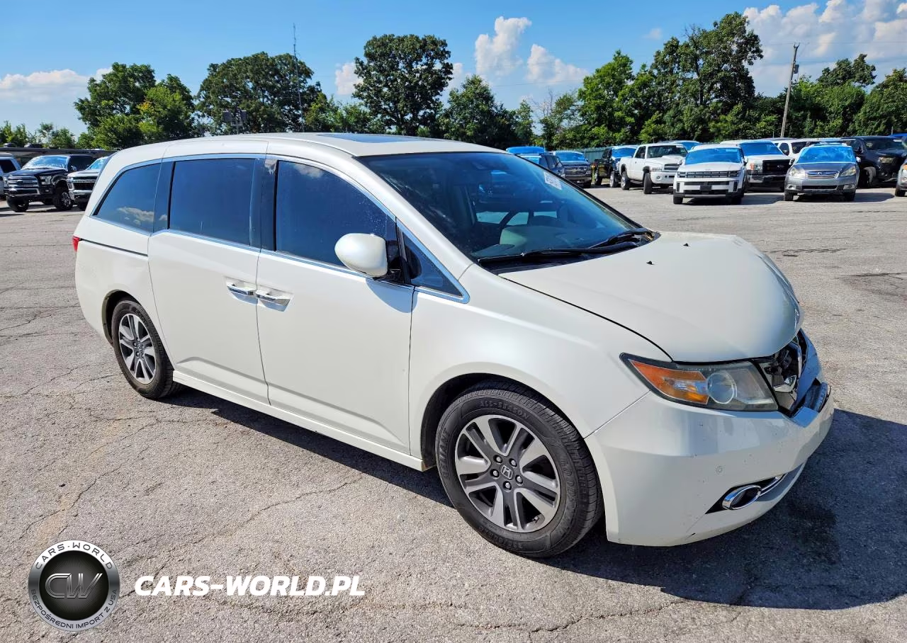 2015 Honda Odyssey Touring VIN:5FNRL5H94FB071923 - 4