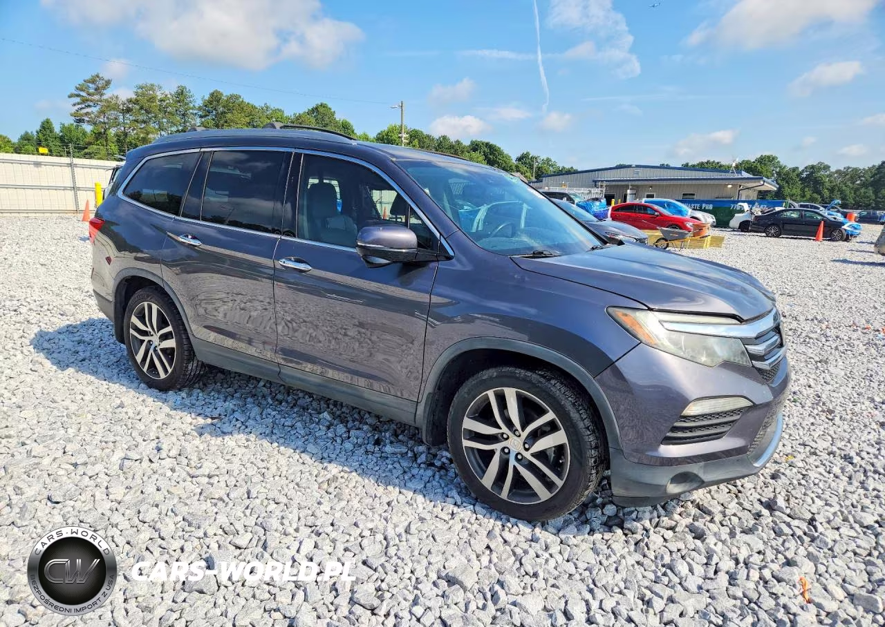 2017 Honda Pilot Touring VIN:5FNYF5H92HB011662 - 4