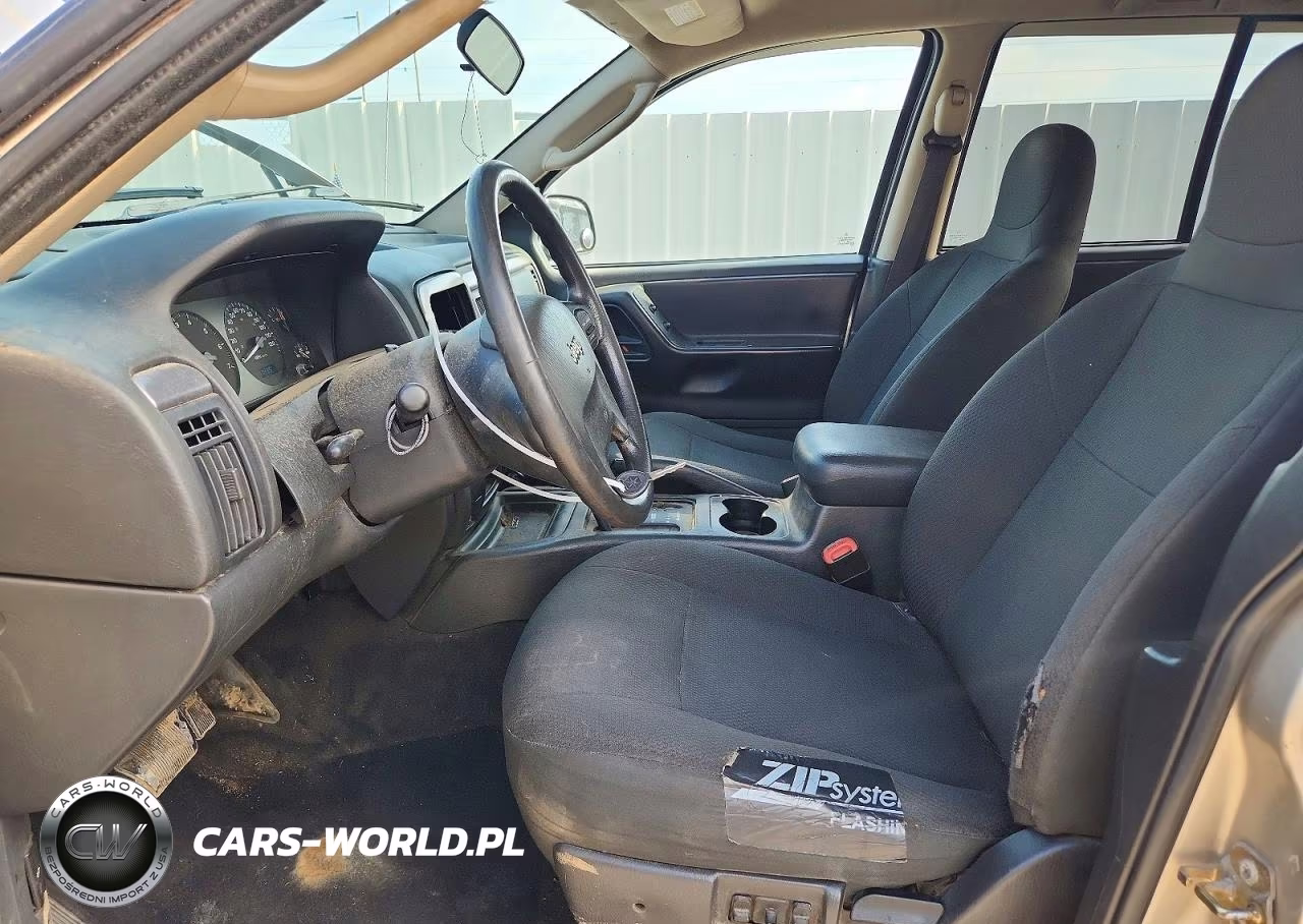 2003 Jeep Grand Cherokee Laredo VIN:1J4GW48S03C527303 - 7