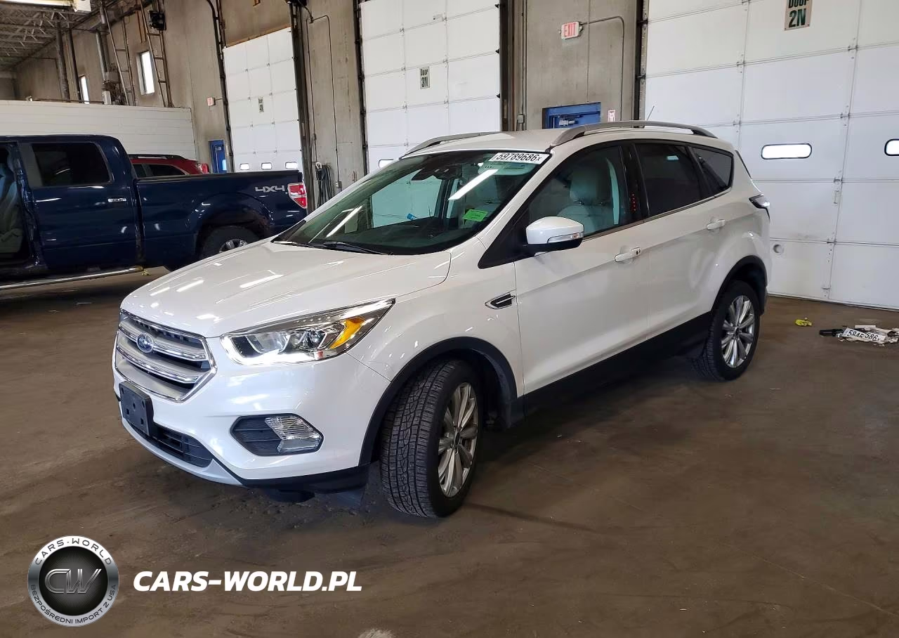 2017 Ford Escape Titanium VIN:1FMCU9J95HUE54697 - 1