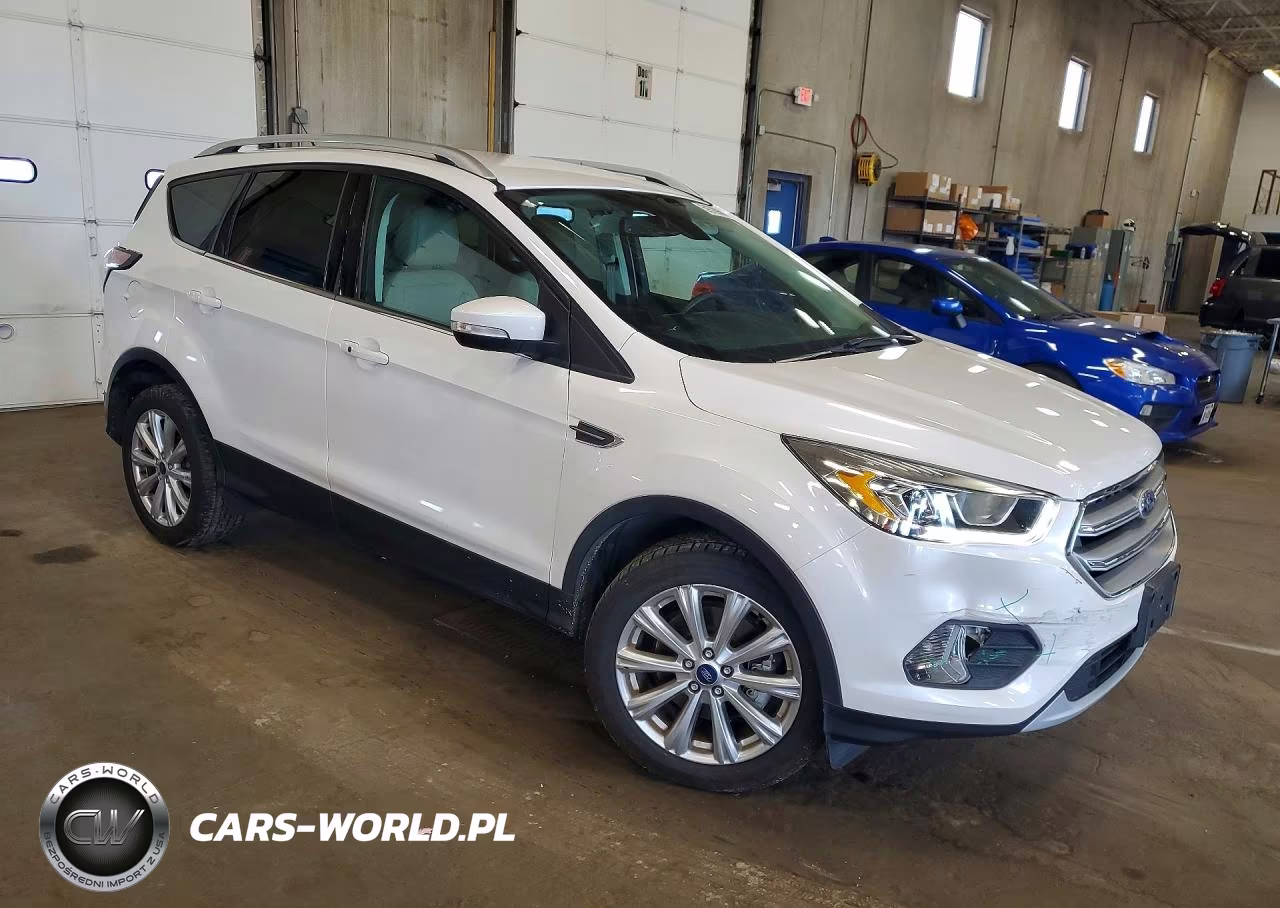2017 Ford Escape Titanium VIN:1FMCU9J95HUE54697 - 4