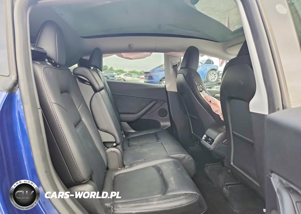 2023 Tesla Model Y VIN:7SAYGAEE4PF879140 - 11