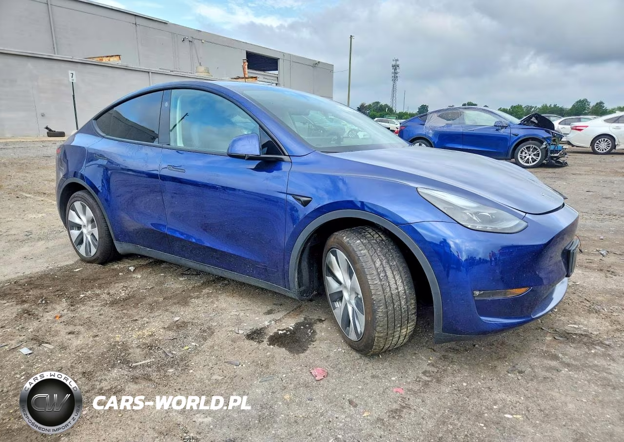 2023 Tesla Model Y VIN:7SAYGAEE4PF879140 - 4