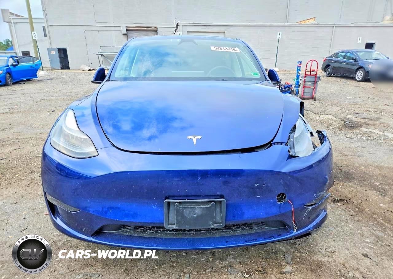2023 Tesla Model Y VIN:7SAYGAEE4PF879140 - 5