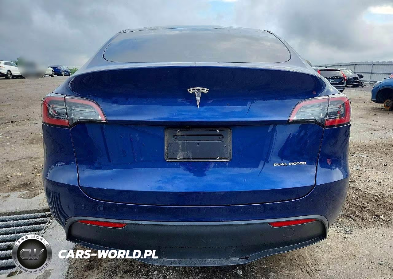 2023 Tesla Model Y VIN:7SAYGAEE4PF879140 - 6