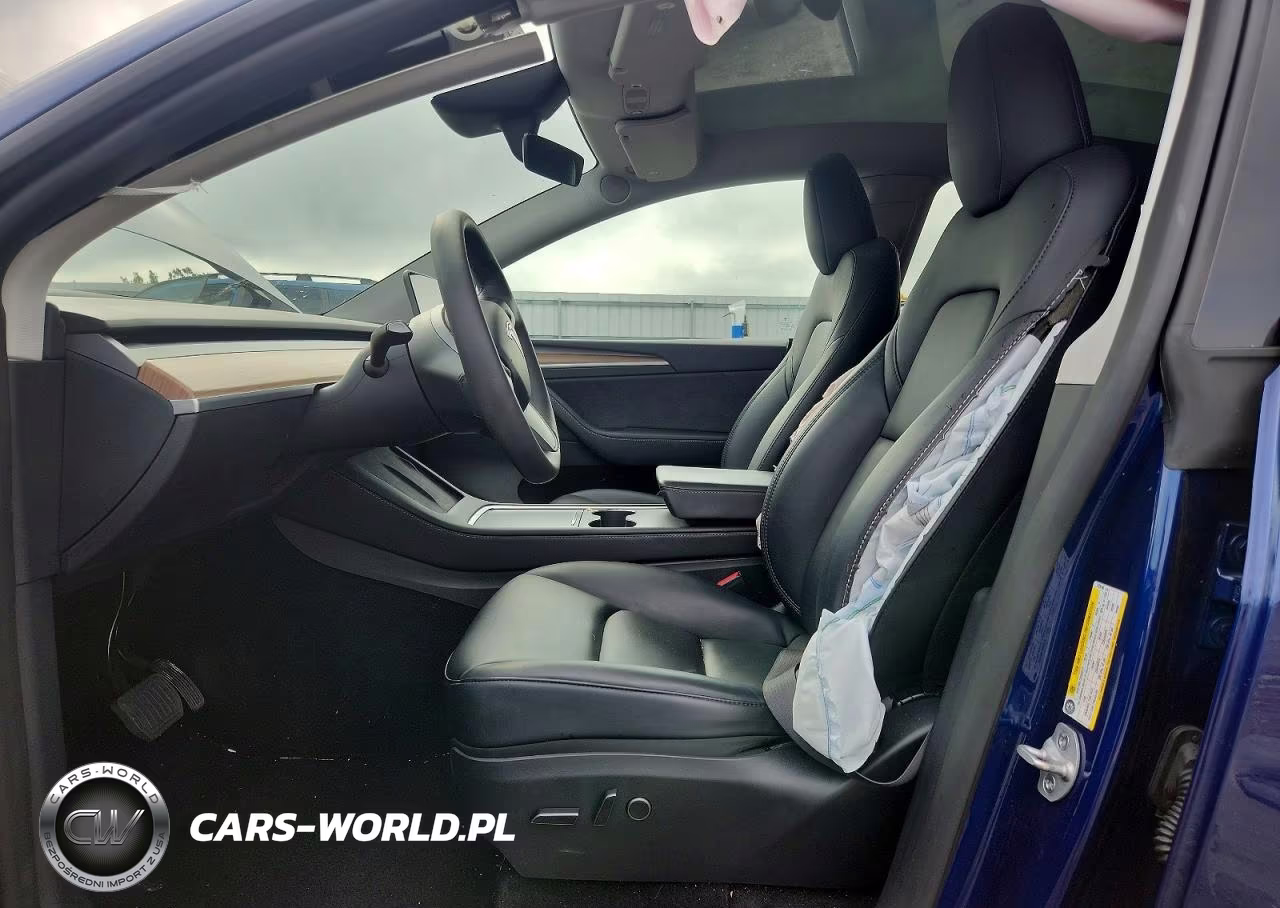 2023 Tesla Model Y VIN:7SAYGAEE4PF879140 - 7