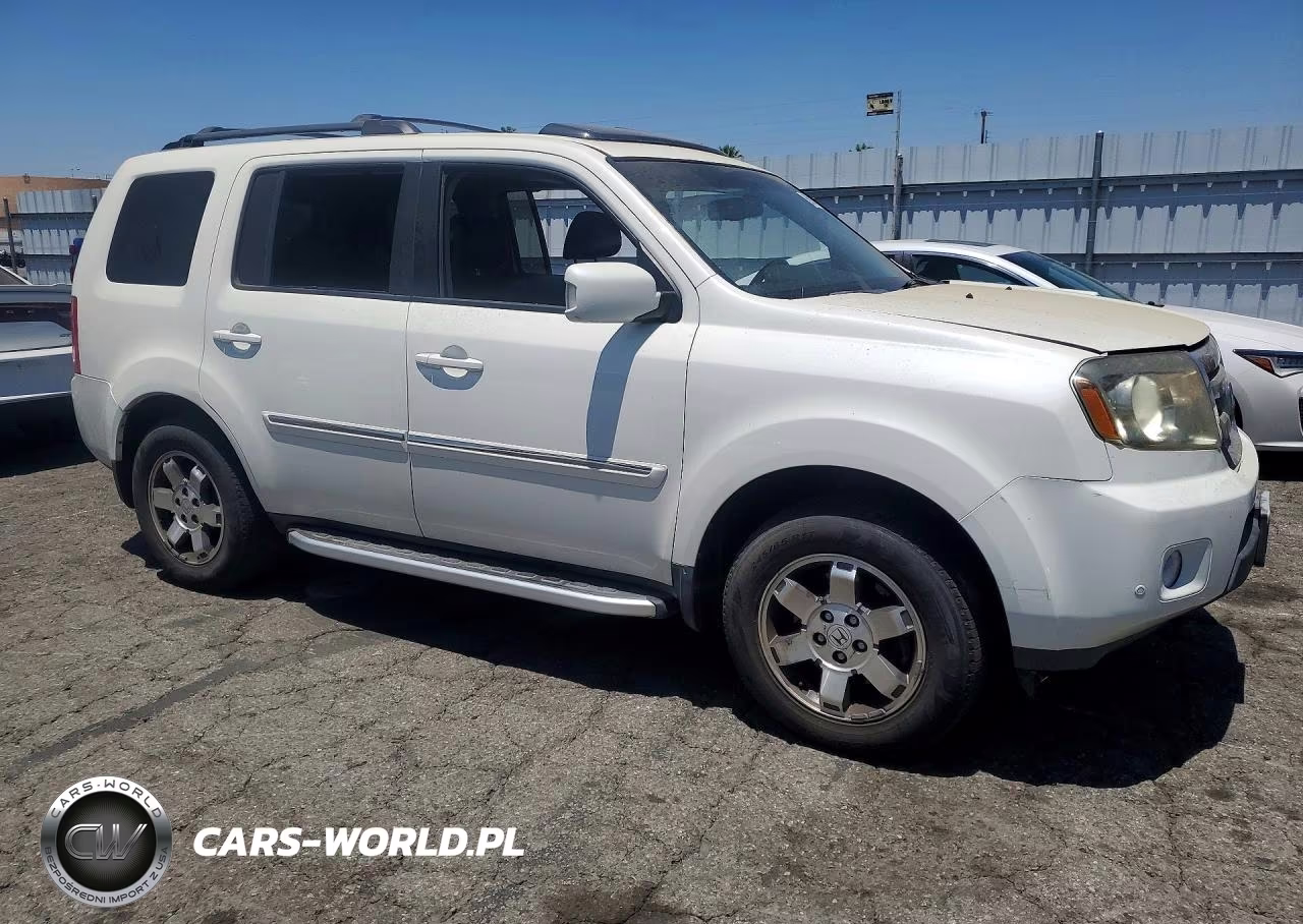2011 Honda Pilot Touring VIN:5FNYF3H97BB052252 - 4