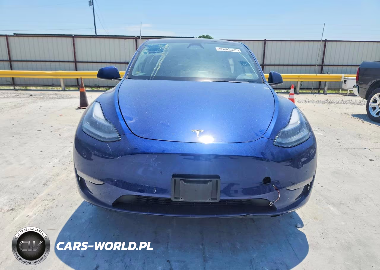 2023 Tesla Model Y VIN:7SAYGDEE3PF874366 - 5