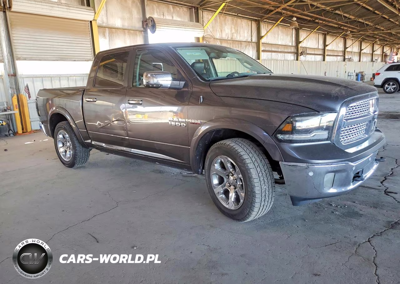 2015 Ram 1500 Laramie VIN:1C6RR7NT9FS711807 - 4