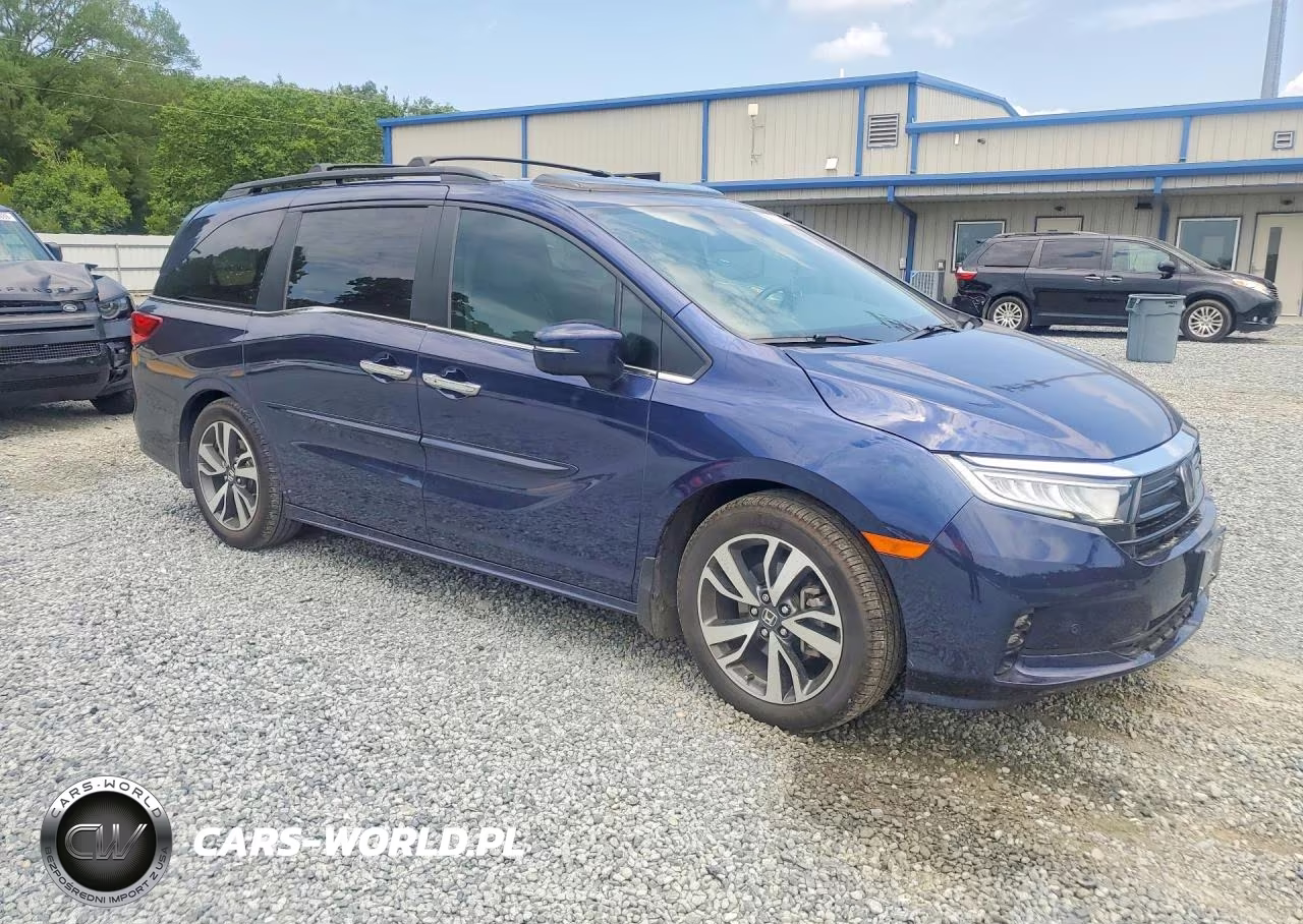 2023 Honda Odyssey Touring VIN:5FNRL6H88PB030824 - 4