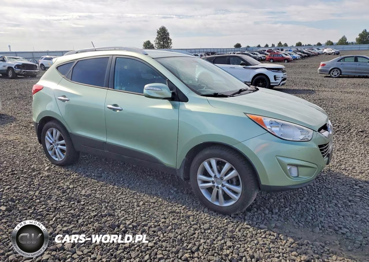 2011 Hyundai Tucson Limited VIN:KM8JUCAC6BU155940 - 4