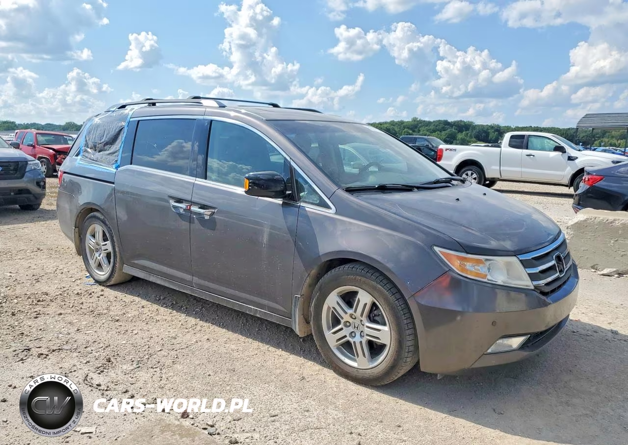 2012 Honda Odyssey Touring VIN:5FNRL5H98CB133349 - 4