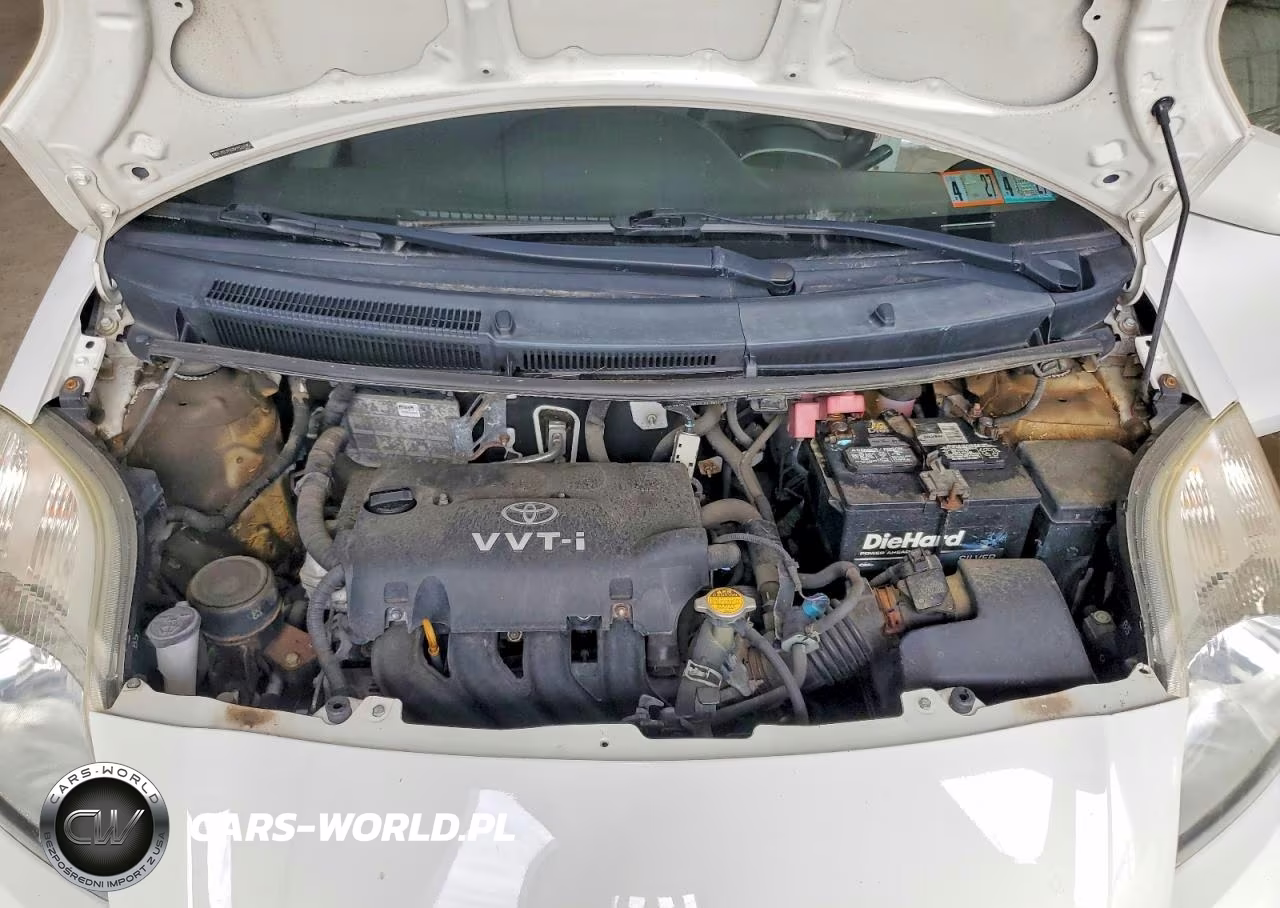 2009 Toyota Yaris Base VIN:JTDJT903X95261856 - 11