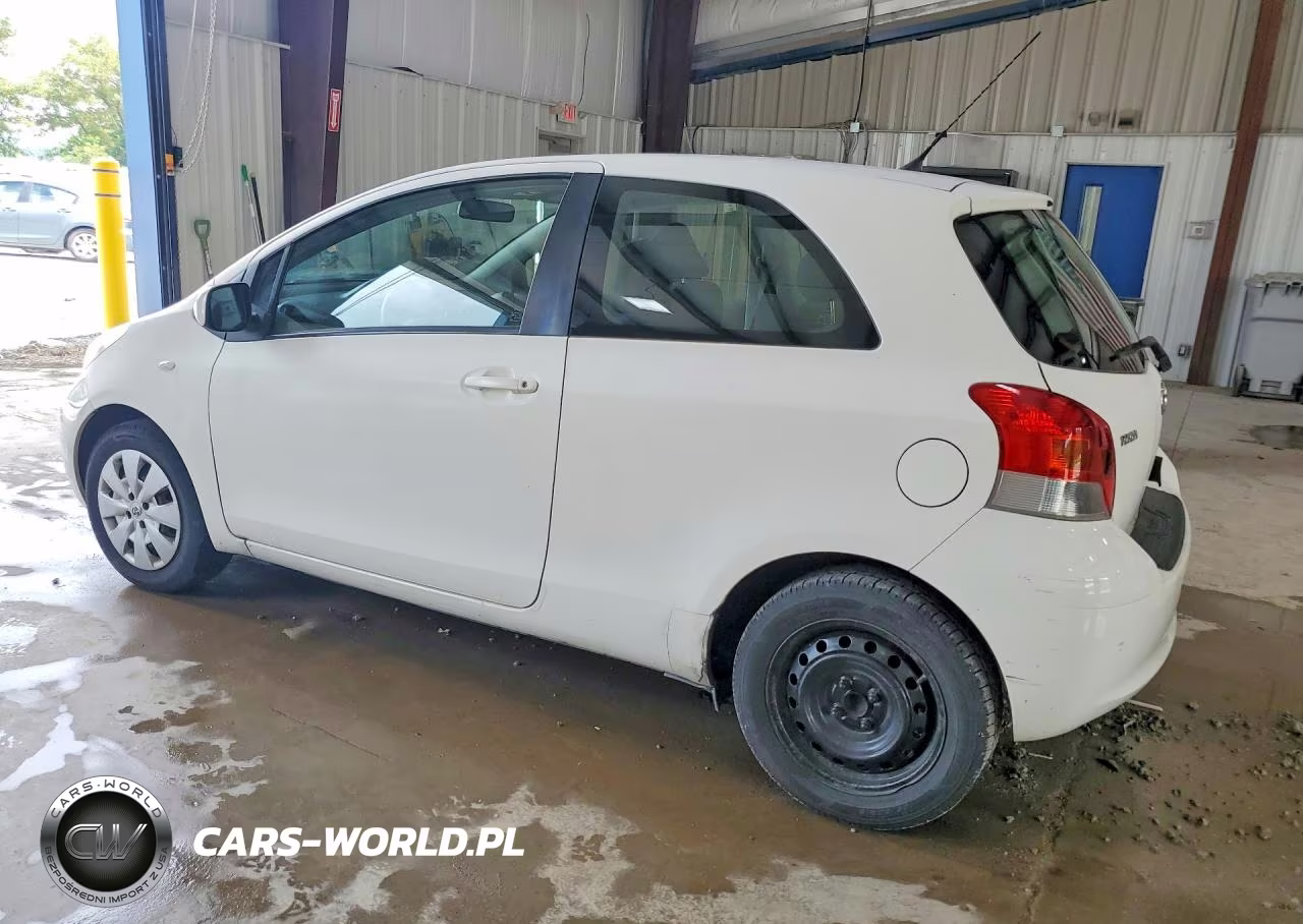 2009 Toyota Yaris Base VIN:JTDJT903X95261856 - 2