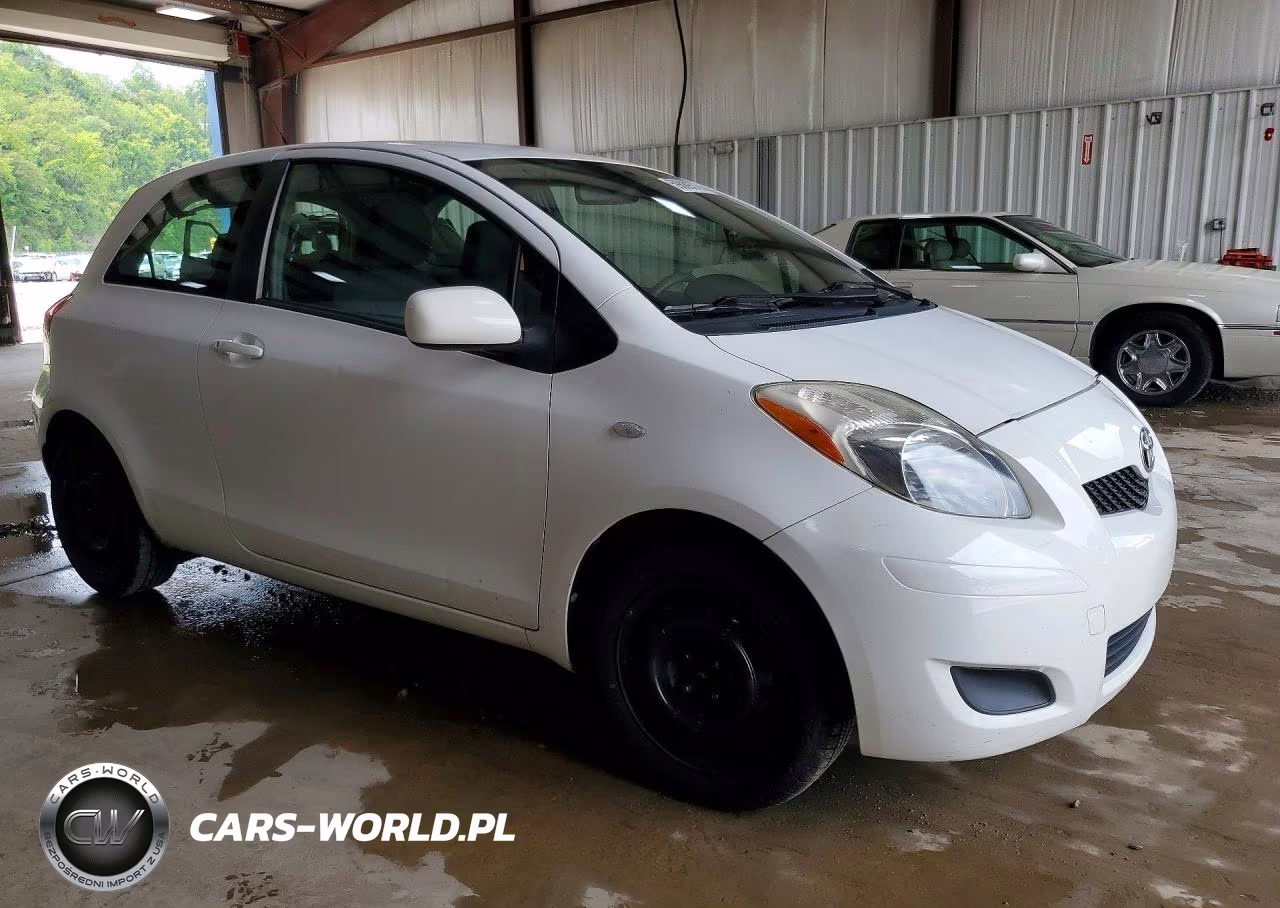 2009 Toyota Yaris Base VIN:JTDJT903X95261856 - 4