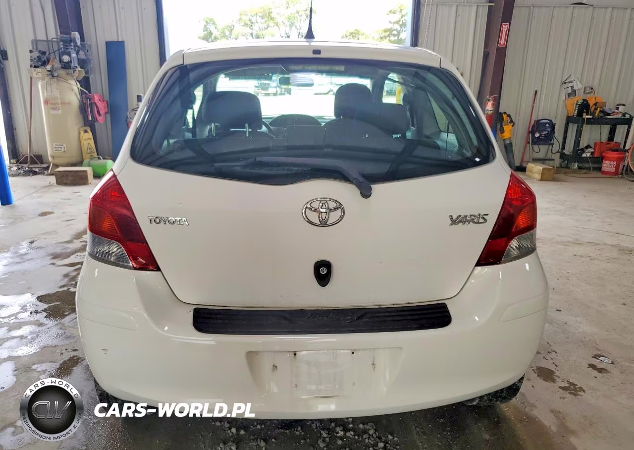 2009 Toyota Yaris Base VIN:JTDJT903X95261856 - 6