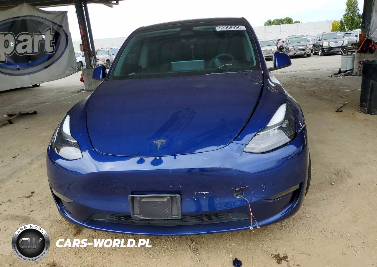 2023 Tesla Model Y VIN:7SAYGDEF6PF622927 - 5
