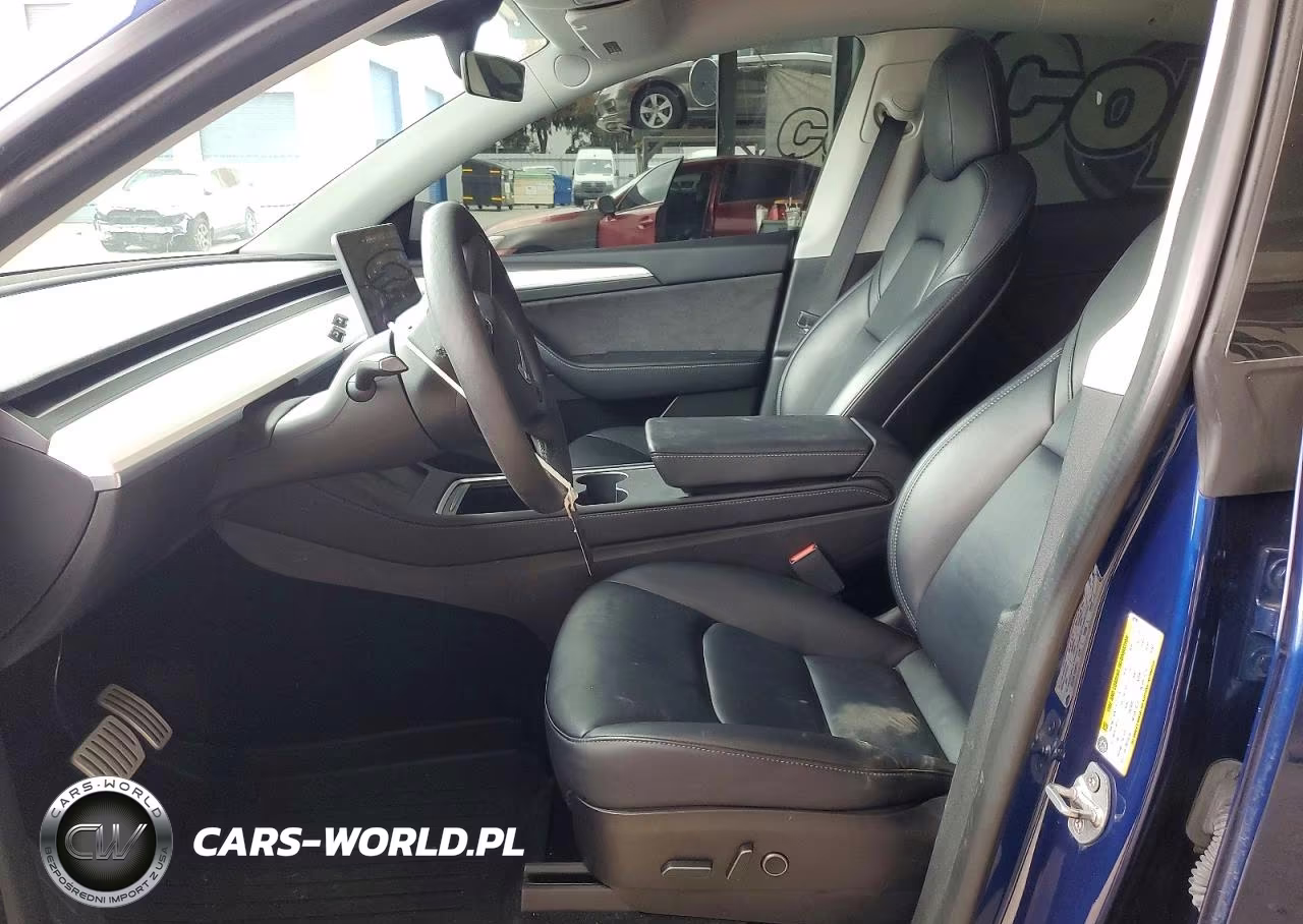 2023 Tesla Model Y VIN:7SAYGDEF6PF622927 - 7